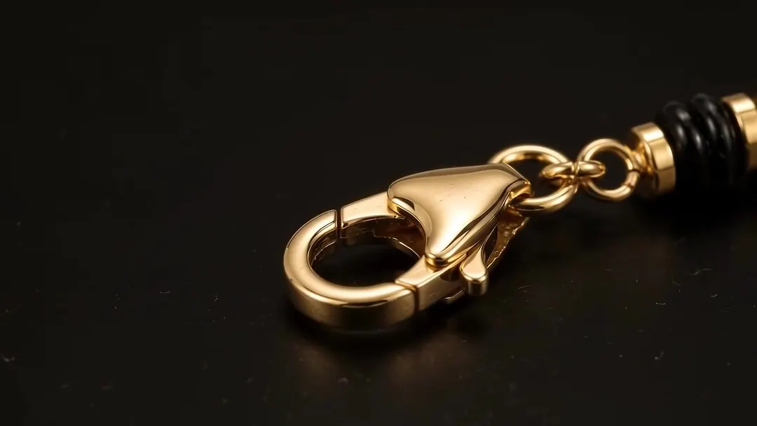 Fecho mosquetão dourado com corrente extensora